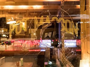 A window was smashed and a Molotov cocktail thrown into Pot Masson restaurant in Montreal Dec. 20, 2016.