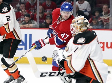 Montreal Canadiens Alexander Radulov looks for a rebound as Anaheim Ducks goalie Jonathan Bernier makes a save during third period of National Hockey League game in Montreal Tuesday Dec. 20, 2016.