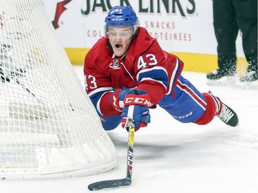 Montreal Canadiens Daniel Carr loses his footing as he tries a wraparound shot during third period of National Hockey League game against the Anaheim Ducks in Montreal Tuesday Dec. 20, 2016.