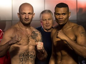 Norbert Dabrowski and Eleider Alvarez, right, are the main event on the Saturday, December 10, 2016 Casino de Montréal fight card. The two weighed in at the casino in Montreal, on Friday, December 9, 2016.