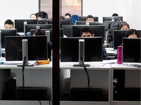Vocational students work in a computer lab in downtown Montreal.