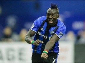 Montreal Impact forward Dominic Oduro celebrates after scoring against the New York Red Bulls during the second half of the Impact's home opening match at the Olympic Stadium in Montreal on Saturday, March 12, 2016.