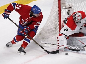 Montreal Canadiens left-wing Phillip Danault goes in on Carolina Hurricanes goalie Cam Ward, during first period NHL action in Montreal on Thursday November 24, 2016.