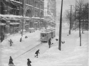 Montreal, snow removal on Ste-Cathrine St. during a blizzard in 1900.