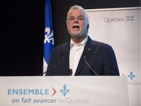 Quebec Premier Philippe Couillard announces a new government strategy for youth, Monday, December 12, 2016 in Quebec City.