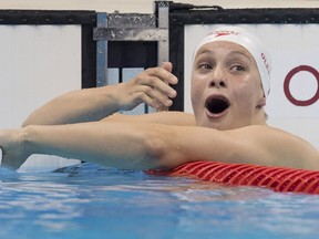 Penny Oleksiak reacts after winning the silver medal in the 100m butterfly final, at the Rio 2016 Olympic Games in Rio de Janeiro, Brazil, Sunday, August 7, 2016.
