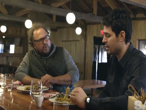 Canadiens' Carey Price and Au Pied de Cochon chef Martin Picard enjoy a dish prepared with moose meat.