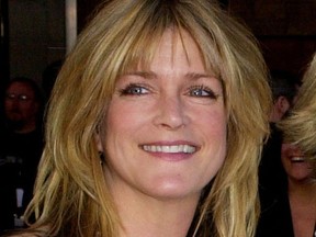In this March 16, 2003 file photo, "Brady Bunch" cast member Susan Olsen appears at ABC's 50th Anniversary Celebration in Los Angeles. LA Talk Radio says Olsen has been fired after she got into an online confrontation with openly gay actor Leon Acord-Whiting. The station announced Friday, Dec. 9, 2016 that it will not tolerate hateful speech and that it has severed ties with Olsen.