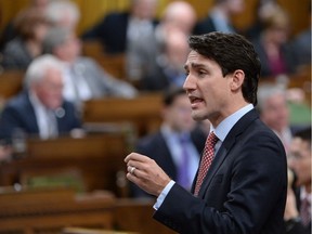 Prime Minister Justin Trudeau answers a question during question period in the House of Commons on Parliament Hill in Ottawa on Tuesday, Dec.13, 2016.
