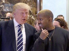 Singer Kanye West and U.S. President-elect Donald Trump speak with the press after their meetings at Trump Tower in New York on Dec. 13, 2016.