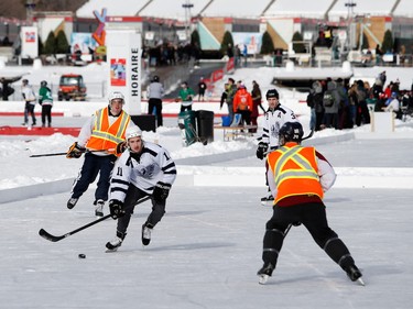 The Phoenix, centre, and the Commission Charbonneau take part in the Classique Montrealaise outdoor hockey tournament on Sunday, Jan. 29, 2017, on the Olympic Basin in Jean-Drapeau Park. (Allen McInnis / MONTREAL GAZETTE)