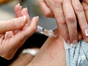 Public health officials are urging residents to get the flu vaccine. File photo/ Postmedia Network