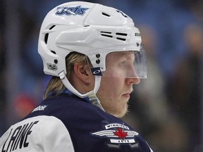 Winnipeg Jets forward Patrik Laine (29) warms up for an NHL hockey game against the Buffalo Sabres, Saturday, Jan. 7, 2017, in Buffalo, N.Y. Rookie star Laine skated with the Jets today for the first time since suffering a concussion earlier this month. THE CANADIAN PRESS/AP/Jeffrey T. Barnes