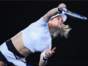 Eugenie Bouchard  serves in her first round match against Louisa Chirico of the USA on Day 1 of the 2017 Australian Open at Melbourne Park on January 16, 2017 in Melbourne, Australia.