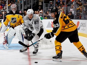 Sidney Crosby (87) of the Pittsburgh Penguins skates against Brad Marchand (63) of the Boston Bruins during the 2017 NHL All-Star Game Semifinal No. 2 (Atlantic vs. Metropolitan) at Staples Center on Sunday, Jan. 29, 2017, in Los Angeles.