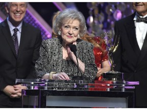 In this April 26, 2015, file photo, Betty White accepts the lifetime achievement award at the 42nd annual Daytime Emmy Awards at Warner Bros. Studios on Sunday, April 26, 2015, in Burbank, Calif.