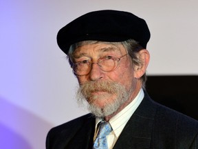In this file picture taken on Sep. 17, 2014, British actor John Hurt arrives for the gala screening of "20,000 Days on Earth" in central London. He died at age 77 on Friday, Jan. 27, 2017.