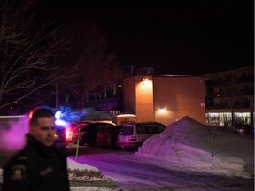 Police officers respond to a shooting in a mosque at a Quebec City mosque on Ste-Foy St. on Sunday, Jan. 29, 2017.