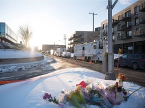 Flowers at a makeshift memorial near the Islamic Cultural Centre in Quebec City, on Jan. 30, 2017.
