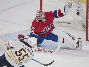 Canadiens goaltender Carey Price makes a save on Buffalo Sabres' Rasmus Ristolainen during third period NHL hockey action in Montreal, Saturday, Jan. 21, 2017.