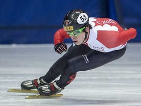 Charle Cournoyer rounds the track during a short track speed skating practice Wednesday, Jan. 11, 2017, in Montreal.