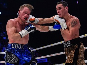 Brandon Cook, right, the super-welterweight from the Toronto suburb of Ajax, Ont., takes a blow from Montreal's Steven Butler on Saturday, Jan. 28, 2017, at the Bell Centre.