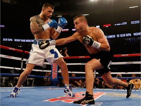 David Lemieux of Laval, right, throws a right at Glen Tapia during the NABO middleweight title fight at T-Mobile Arena on May 7, 2016 in Las Vegas, Nevada.