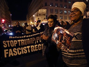 Anti-Trump protesters gather outside of the Deplora Ball at the National Press Building, on January 19, 2017 in Washington, DC. Donald Trump will be sworn in as the U.S. 45th President on January 20th.