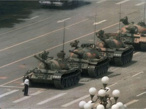 June 1989: A Chinese man blocks a line of tanks in Beijing's Tiananmen Square.