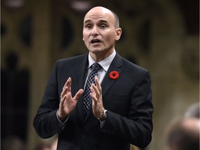 Minister of Families, Children and Social Development Jean-Yves Duclos rises during Question Period on Parliament Hill, Friday, Oct. 28, 2016 in Ottawa.