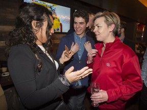 Conservative leadership candidate Kellie Leitch, right, speaks with supporters at La Cage restaurant in Complexe Desjardins on Wednesday, January 4, 2017, as part of her tour of Quebec.