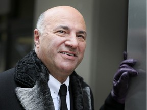 Kevin O'Leary walks along John St. in Toronto on Wednesday. O'Leary, who is originally from Montreal, launched his campaign for Conservative Party leadership the day after the French-language debate so he wouldn't have to participate.