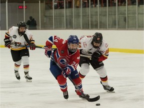 Les Canadiennes forward Ann-Sophie Bettez (No. 24) controls the puck during a Canadian Women's Hockey League game against the Calgary Inferno at the Civic Centre in Dollard-des-Ormeaux, Jan. 15, 2017.