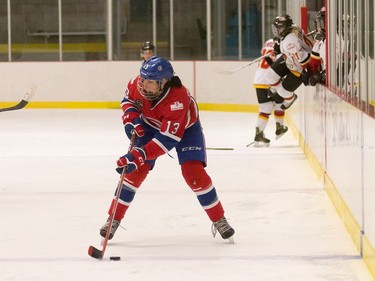 Les Canadiennes forward Caroline Ouellette (No. 13) in action during a Canadian Women's Hockey League game at the Civic Centre in Dollard-des-Ormeaus, Jan. 15, 2017. Les Canadiennes beat the Calgary Inferno 4-1. Photo credit: Céline Gélinas/CWHL