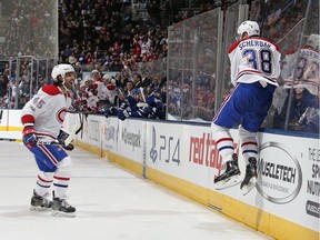 Canadiens' Nikita Scherbak jumps for joy in celebration of his first NHL goal against the Toronto Maple Leafs on Saturday, Jan. 7, 2017, in Toronto.