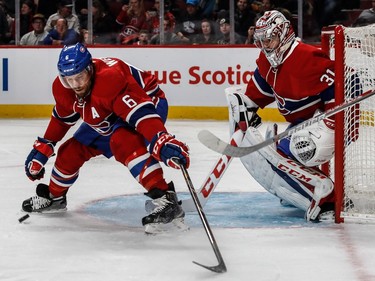 Montreal Canadiens defenceman Shea Weber (6) and teammate goalie Carey Price (31) eye the puck during 2nd period NHL action at the Bell Centre in Montreal, on Monday, January 9, 2017.