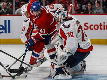 Montreal Canadiens left wing Paul Byron (41) battles for the loose puck in front of Washington Capitals goalie Braden Holtby (70) during 3rd period NHL action at the Bell Centre in Montreal, on Monday, January 9, 2017.