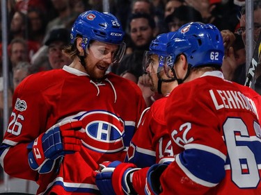 Montreal Canadiens defenceman Jeff Petry (26) congratulates teammate Montreal Canadiens centre Tomas Plekanec (14) on Plekanec's goal against the Washington Capitals during 3rd period NHL action at the Bell Centre in Montreal, on Monday, January 9, 2017.