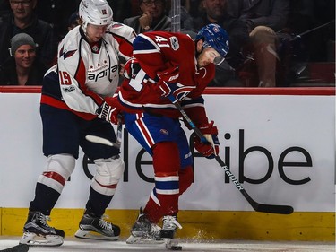 Washington Capitals centre Nicklas Backstrom (19) and Montreal Canadiens left wing Paul Byron (41) battle for the puck along the boards during 1st period NHL action at the Bell Centre in Montreal, on Monday, January 9, 2017.