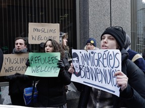 Demonstrators gather outside the U.S. consulate in Montreal Jan. 30, 2017, to protest against U.S. President Donald Trump's executive order that barring citizens from seven predominantly Muslim countries from entering the U.S. for at least 120 days.