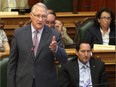 Then-mayor Gérald Tremblay answers questions during a council meeting at Montreal city hall in 2012, with Michael Applebaum seated next to him.