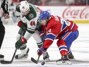 Montreal Canadiens Phillip Danault wins a face-off against Minnesota Wild's Tyler Graovac Dec. 22, 2016.