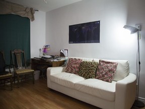 Leather sofa in the apartment of Yevgen Nazarenko and Chitra Narayanan. At the window the couple have each created their own office space.