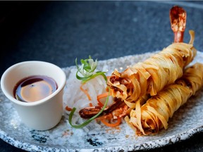 And the dishes kept coming. Fat shrimp brushed with sriracha were baked in ribbons of dough as thin as spring roll wrappers and served with a sweet and sour chicha morada sirop dipping sauce. What fun to crunch into those mummified crustaceans, shattering through that shell to hit the soft flesh within.