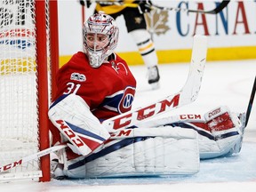 Canadiens goalie Carey Price falls back into his net after making a save against the Pittsburgh Penguins during NHL action at the Bell Centre on Wednesday, Jan. 18, 2017.