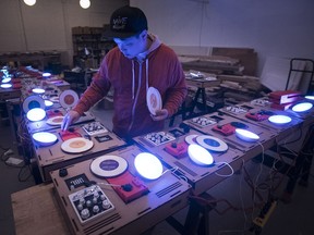 Kid Koala tries out the homemade turntables that will be used by attendees of his Satellite Concert residency at the Phi Centre. "It’s like when everyone holds up lighters at a rock concert," he says. "It becomes something beyond what you think a bunch of glimmering lighters would look like."