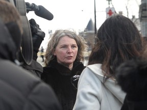 Jeannette Holman-Price speaks to the media during a press conference outside city hall on Sunday,  Jan. 22, 2017. Her daughter Jessica was struck and killed by a snow-removal truck in Westmount in December of 2005, after pushing her younger brother to safety.