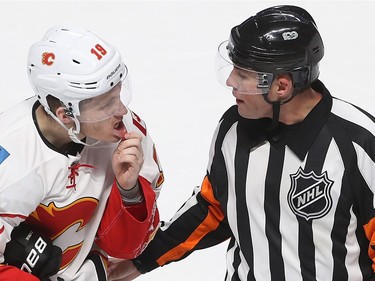 Calgary Flames' Matthew Tkachuk shows some lip to referee Francis Charon during second period NHL action in Montreal on Tuesday January 24, 2017. Montreal Canadiens' Jeff Petry was given a high-sticking penalty on the play.