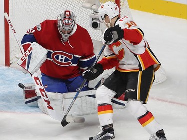 Montreal Canadiens goalie Carey Price blocks shot by Calgary Flames' Kris Versteeg (10) during first period NHL action in Montreal on Tuesday January 24, 2017.