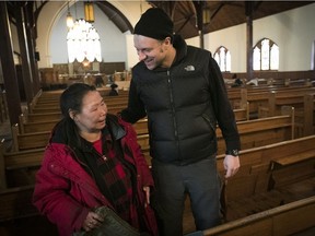 David Chapman, right, who administers the shelter at the St. Stephen's Anglican church, shares a laugh  with Lucie Partridge, right, while she's at the shelter on Thursday January 26, 2017.